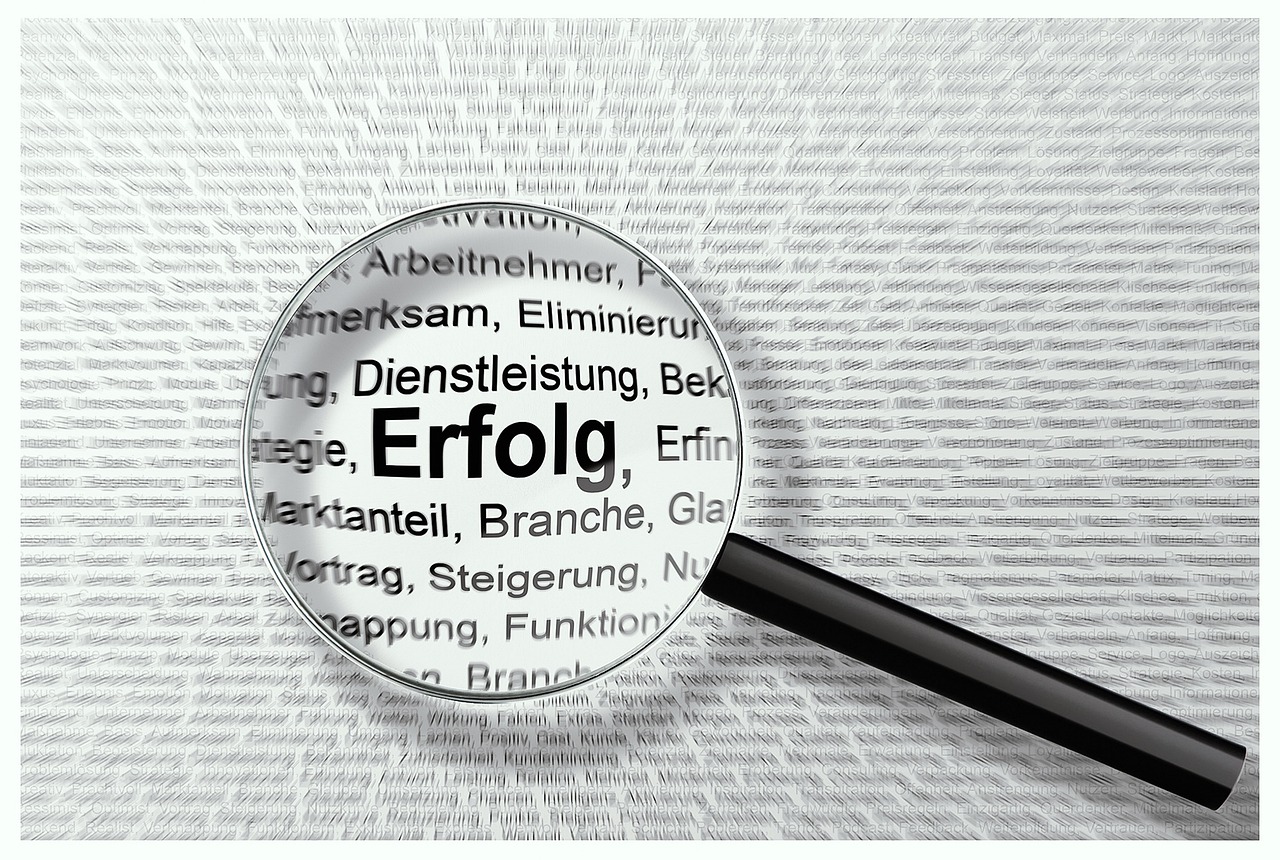 A magnifying glass hovering over financial documents as part of a troubleshooting process.