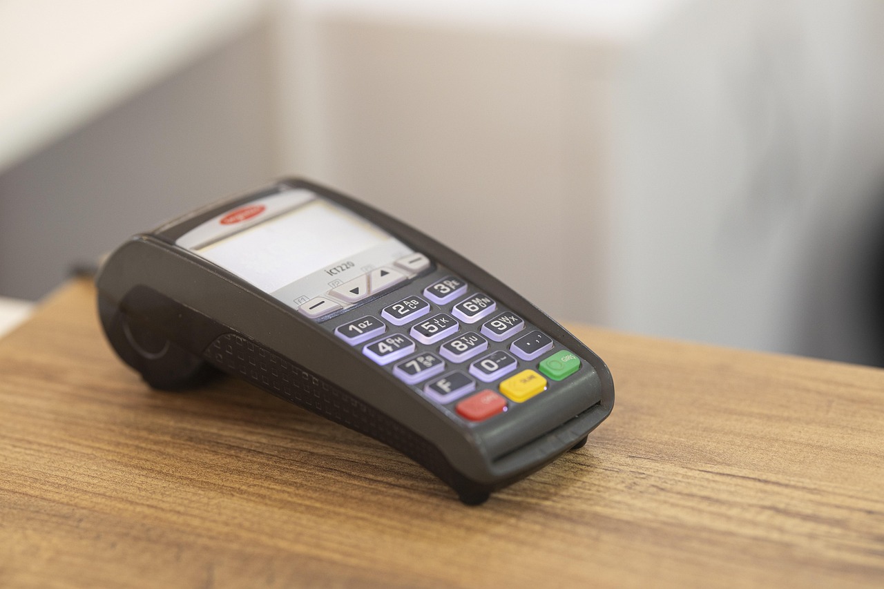 A digital display showing a credit score meter in the good to excellent range.