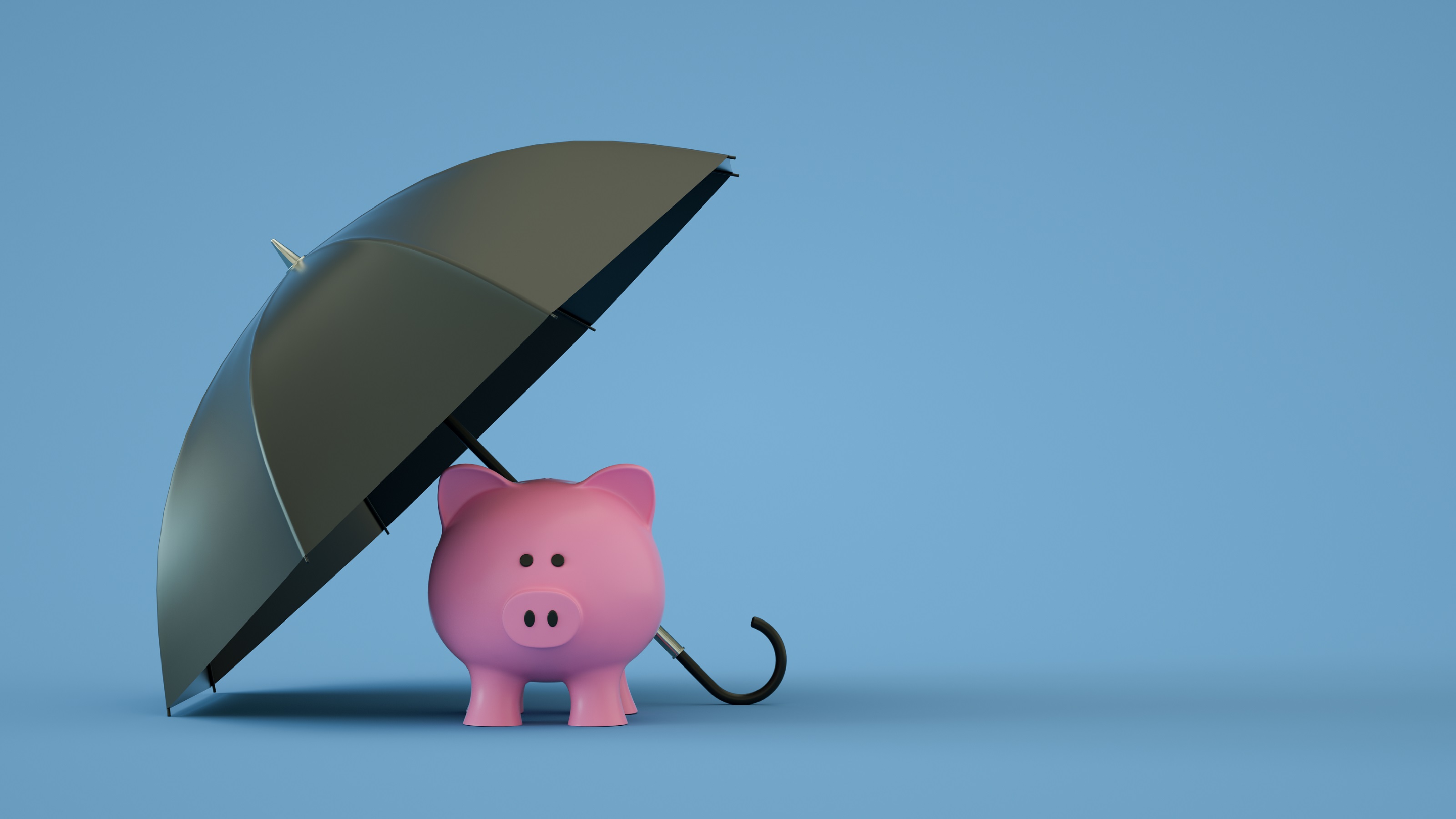 A pink ceramic piggy bank sitting securely under a small, tilted grey umbrella.