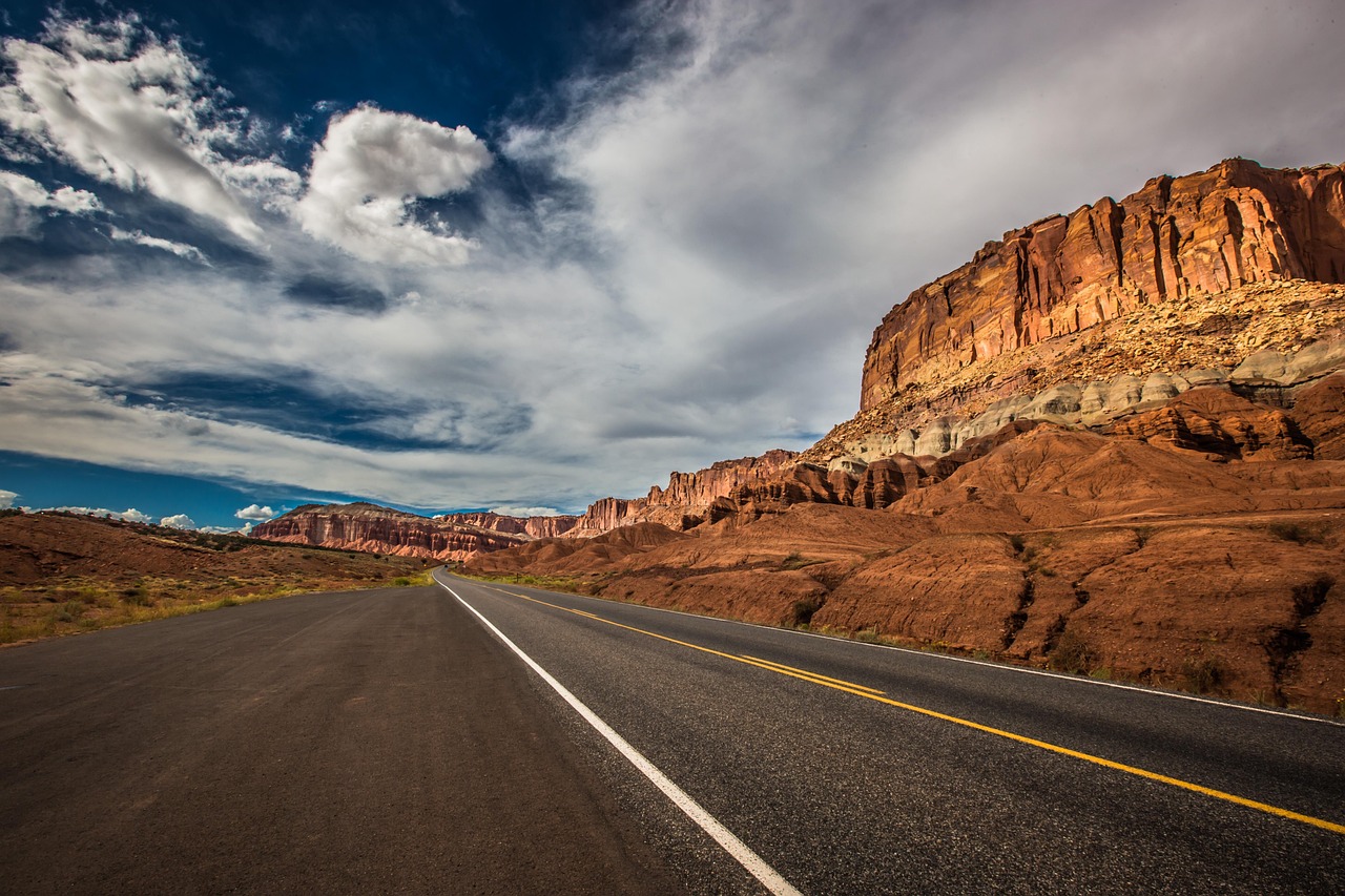 A fork in the road with signs representing the choice between different financial strategies.