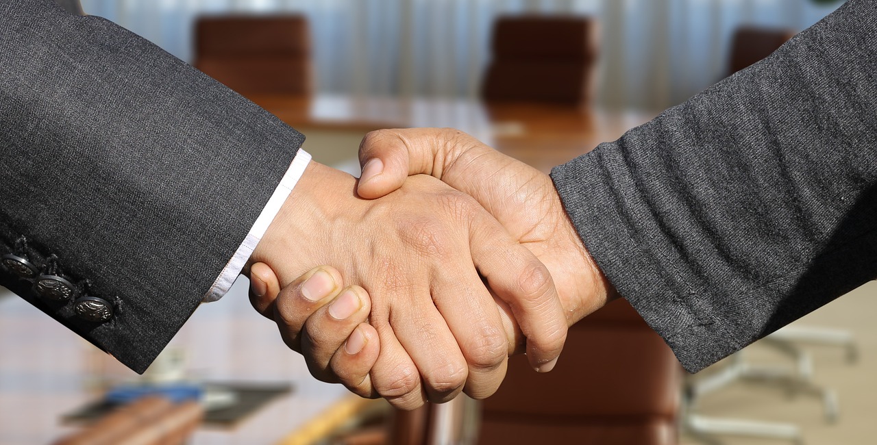 A professional consultation between a landlord and a potential tenant.