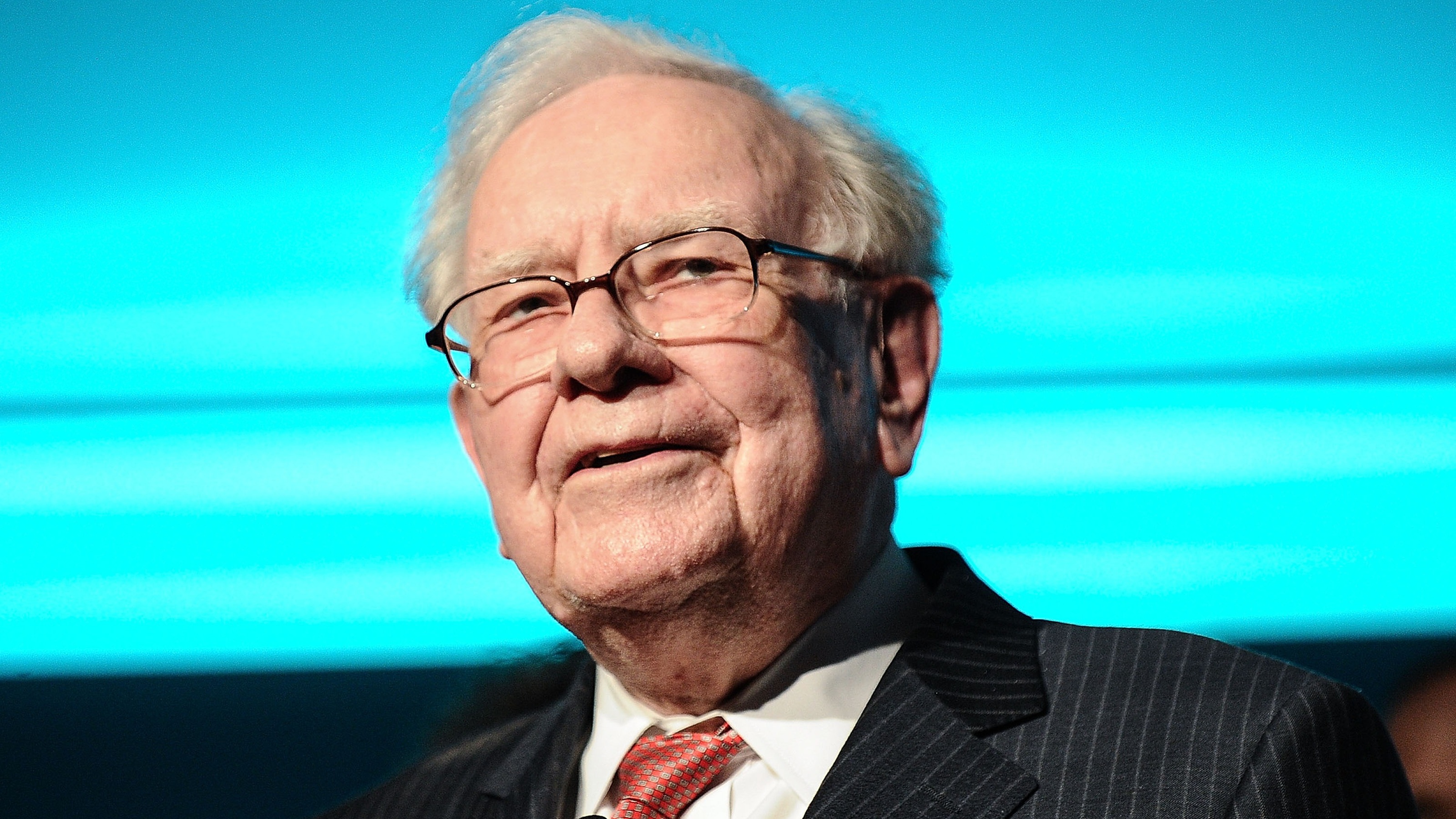 Investor Warren Buffett speaking at a conference.