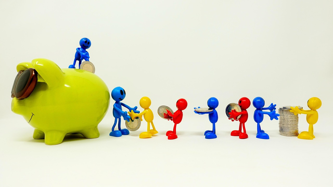 A small piggy bank under a miniature umbrella, representing a protective emergency fund.