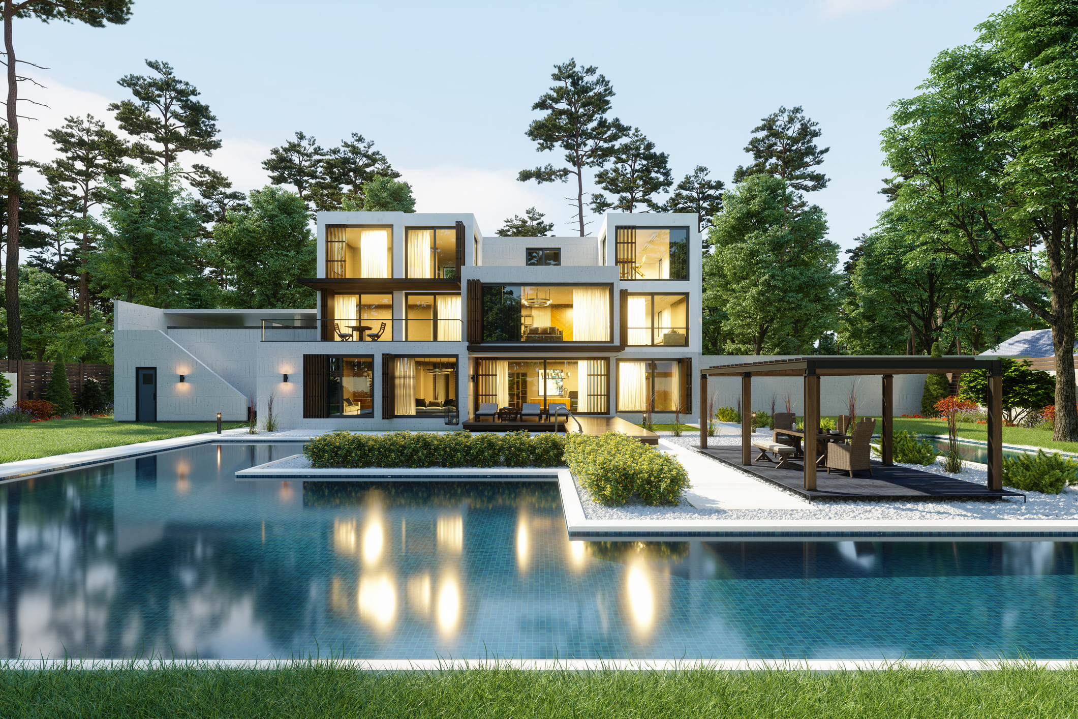 A luxury modern home with a large swimming pool and glass-walled exterior.