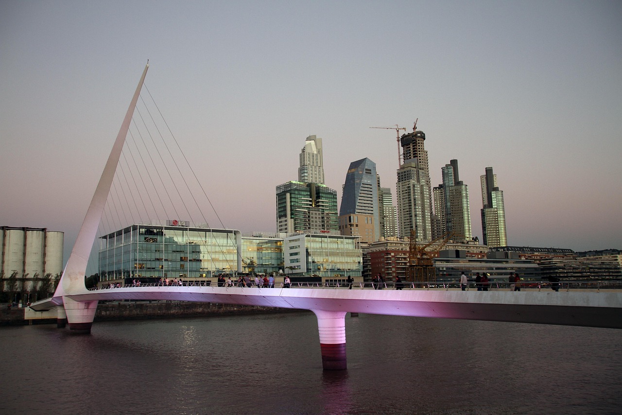 A wide shot of a modern city skyline from a high-rise office window, signifying broad financial horizons.