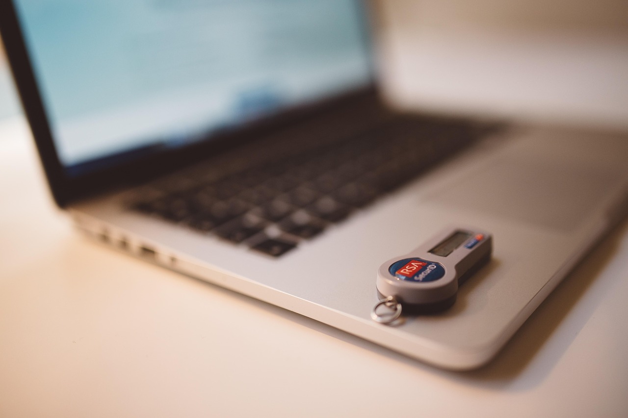 A digital padlock and shield representing identity theft protection and credit security.